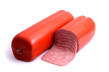 Boiled large pork sausage whole and sliced isolated on white background