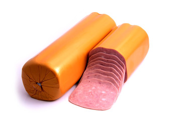 Boiled large pork sausage whole and sliced isolated on white background