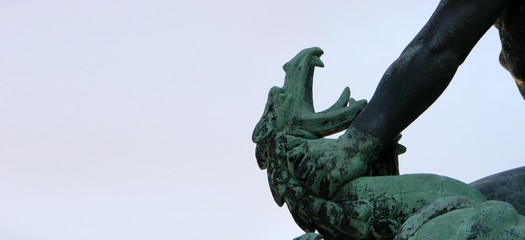 Close up of the dragon head from the Dragon Slayer sculpture near the Liberty Monument at Gellert Hill, Budapest, Hungary