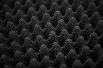 Texture soundproof panel of polyurethane foam. Abstract black rubber foam background. - obrazy, fototapety, plakaty