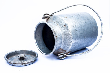 Close up of sliver colored milk chum or milkcan isolated on white used to store or transport milk...