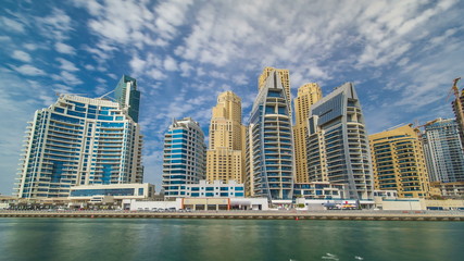 View of Dubai Marina Towers in Dubai at day time timelapse hyperlapse