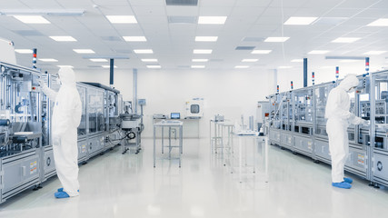 Scientists Working in Laboratory. Facility with Modern Industrial Machinery. Product Manufacturing...