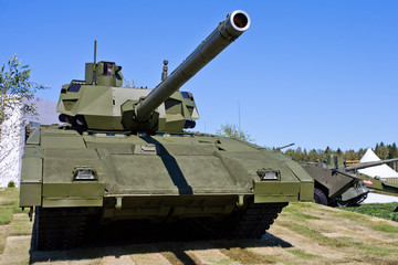 Fototapeta na wymiar T-14 Armata tank at the military exhibition. tank in front.