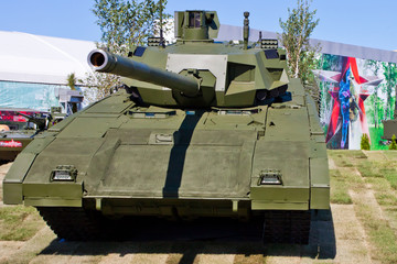  T-14 Armata tank at the military exhibition. Tank and Russian star with a tricolor.
