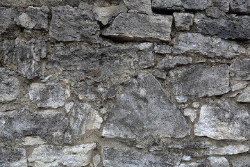 Original textured surface of of a natural coarse stone