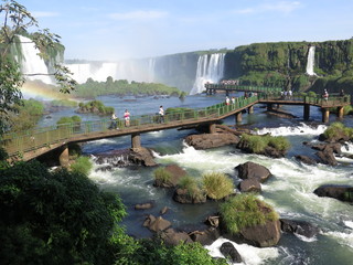 Rainbow in the Devil's Throat (Garganta del Diablo) of the Iguazu waterfalls, the largest in the world. Iguazu Falls located on the Iguazu River on the border of the Argentina,Brazil