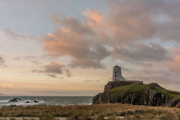 Fototapeta na wymiar The Llanddwyn island lighthouse, Twr Mawr at Ynys Llanddwyn on Anglesey, North Wales.