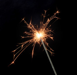 Fototapeta premium Sparkler isolated on black