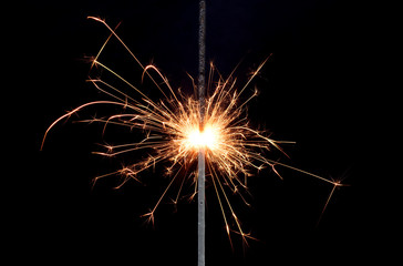 Fototapeta premium Sparkler isolated on black