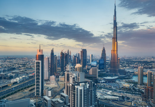 Scenic view on downtown Dubai, United Arab Emirates at sunset. Colourful travel background.