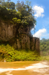 Iguazu Falls nature in Argentina with a view of trees and the river with a wet lense