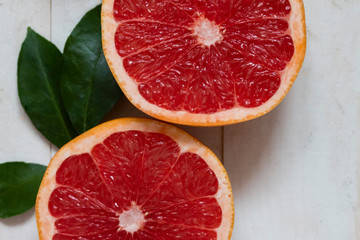 Fototapeta na wymiar two halves of ripe juicy grapefruit