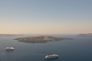 Obraz premium Santorini Fira, Greece - landscape with boat
