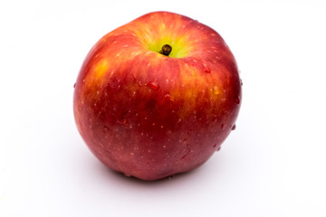 Two whole peaches on the white background