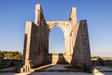 Fototapeta na wymiar La Flotte, France. The Notre-Dame-de-Re Abbey or Abbaye des Chateliers, an ancient 12th Century Cistercian abbey in the Ile de Re island, now in ruins