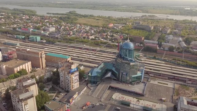 Big blue train station building near railroad city Samara, Russia. Aerial photo