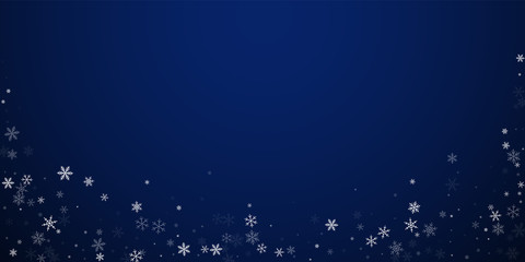 Sparse snowfall Christmas background. Subtle flyin