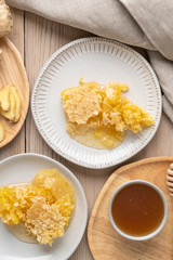 Fresh honeycomb and ginger used for making a therapeutic tea to help combat the flu and other illnesses. 