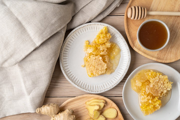Fresh honeycomb and ginger used for making a therapeutic tea to help combat the flu and other illnesses. 