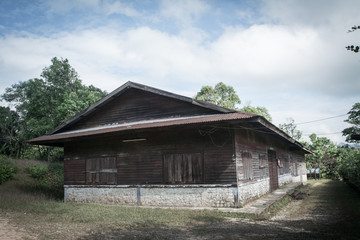 Fototapeta na wymiar The old wooden building of president office of Pilok mine in Thong Pha Phum National Park, Kanchanaburi province, Thailand.