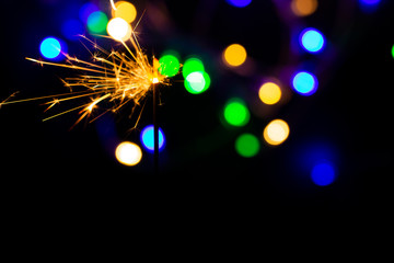 Christmas golden lights. Background of bright glow bokeh