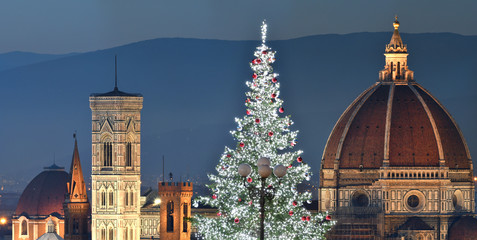 Illuminated Christmas Tree at Piazzale Michelangelo with the Cathedral of Santa Maria del Fiore on...