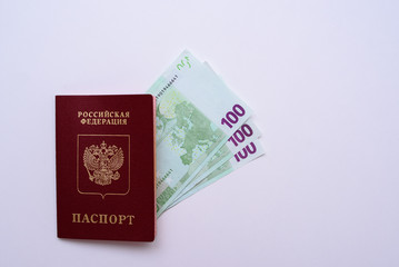Russian international passport with euro in the man's hand. White background