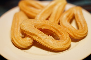 traditional spanish desert churros with hot cocoa drink 