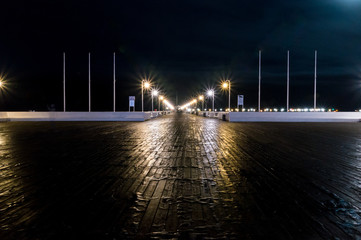 The Sopot pier in the city of Sopot at night. The pier is the longest wooden pier in Europe.