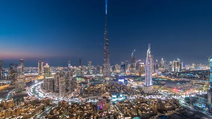 Deurstickers Dubai Downtown day to night timelapse view from the top in Dubai, United Arab Emirates © neiezhmakov