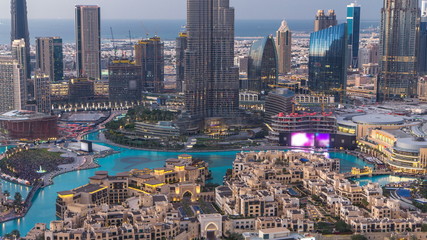 Fototapeta na wymiar Dubai Downtown day to night timelapse view from the top in Dubai, United Arab Emirates