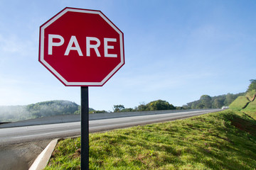 Red plate stop PARE transit sign