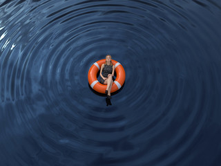   woman are floating on the rescue buoys, aerial view © Photobank