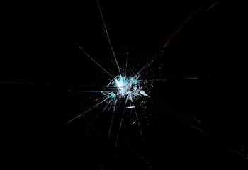 Broken glass texture and background, isolated on black, cracked window effect, clipping path   