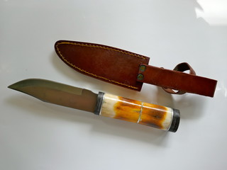 Knife, hunting knife with deer horn handle and leather sheath