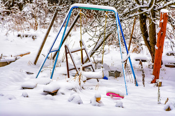 Winter sketches. Fluffy snow on houses, fences and other buildings.