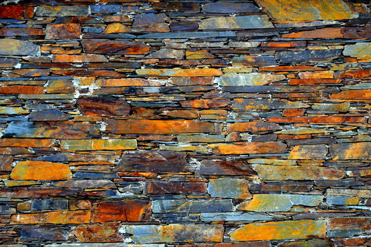 Close-up detail view of an old traditional stone wall built from schist in Piod&atilde;o, made of shale rocks stack, one of Portugal's schist villages in the Aldeias do Xisto.