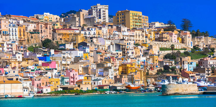 Panoramic view of colorful Sciacca town in Sicily Italy high resolution wide angle landscape of historic fishing port and harbor with multicolored houses Mediterranean coast travel destination