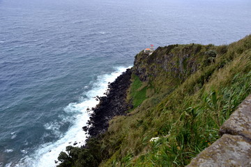 Fototapeta na wymiar Lighthouse Ponta do Arnel in Sao Miguel island, Azores