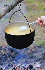cooking in smoked tourist kettle