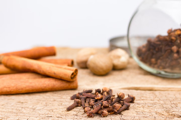 Spice Jar with Cloves and Cinnamon Sticks