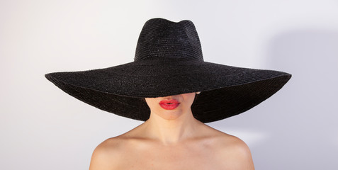 Beautiful woman with hat and red lips.Fashion retro