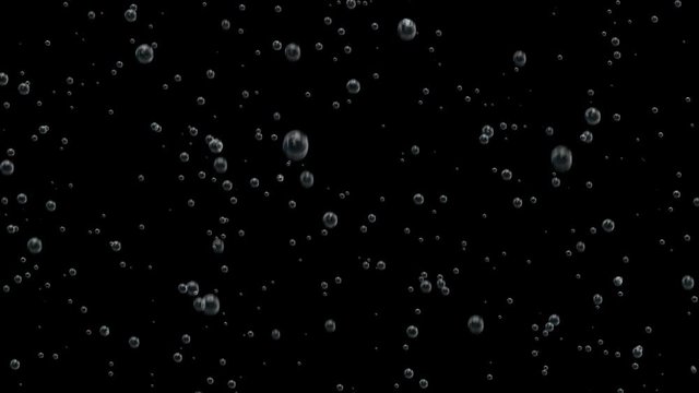 Cinematographic image of rising bubbles.