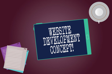 Word writing text Website Development Concept. Business concept for developing a web site for the Internet Tablet Empty Screen Cup Saucer and Filler Sheets on Blank Color Background