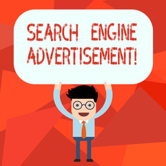 Conceptual hand writing showing Search Engine Advertisement. Business photo text Placing online advertisements on webpages Man Holding Above his Head Blank Rectangular Colored Board