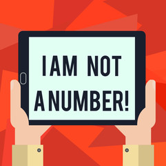 Word writing text I Am Not A Number. Business concept for Equality fighting for your rights individuality respect Hu analysis Hand Holding Blank Screen Tablet Smartphone Display Unit photo