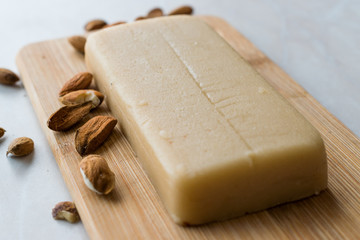Homemade Almond Paste Whole Marzipan on Wooden Board.