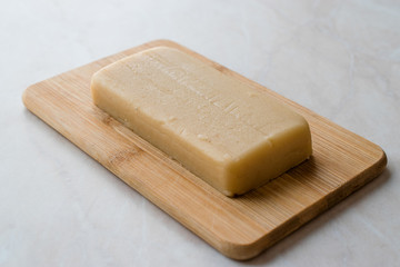 Homemade Almond Paste Whole Marzipan on Wooden Board.