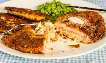 Eating Chicken Cordon Bleu with Pancakes and English Peas